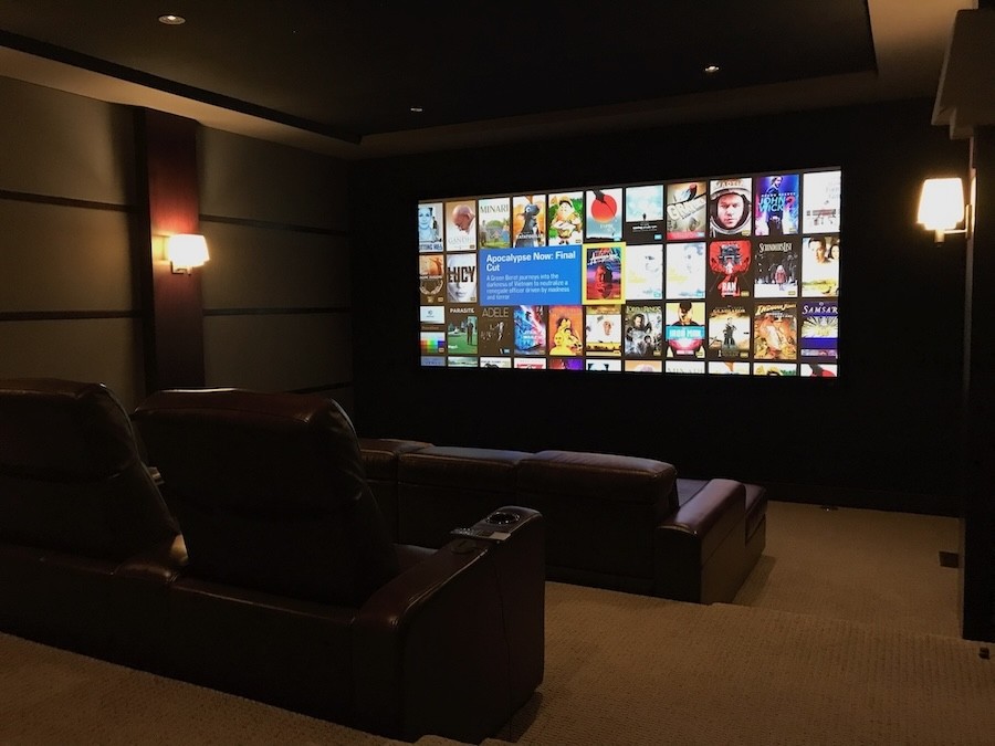 luxury home theater showing a Kaleidescape menu screen